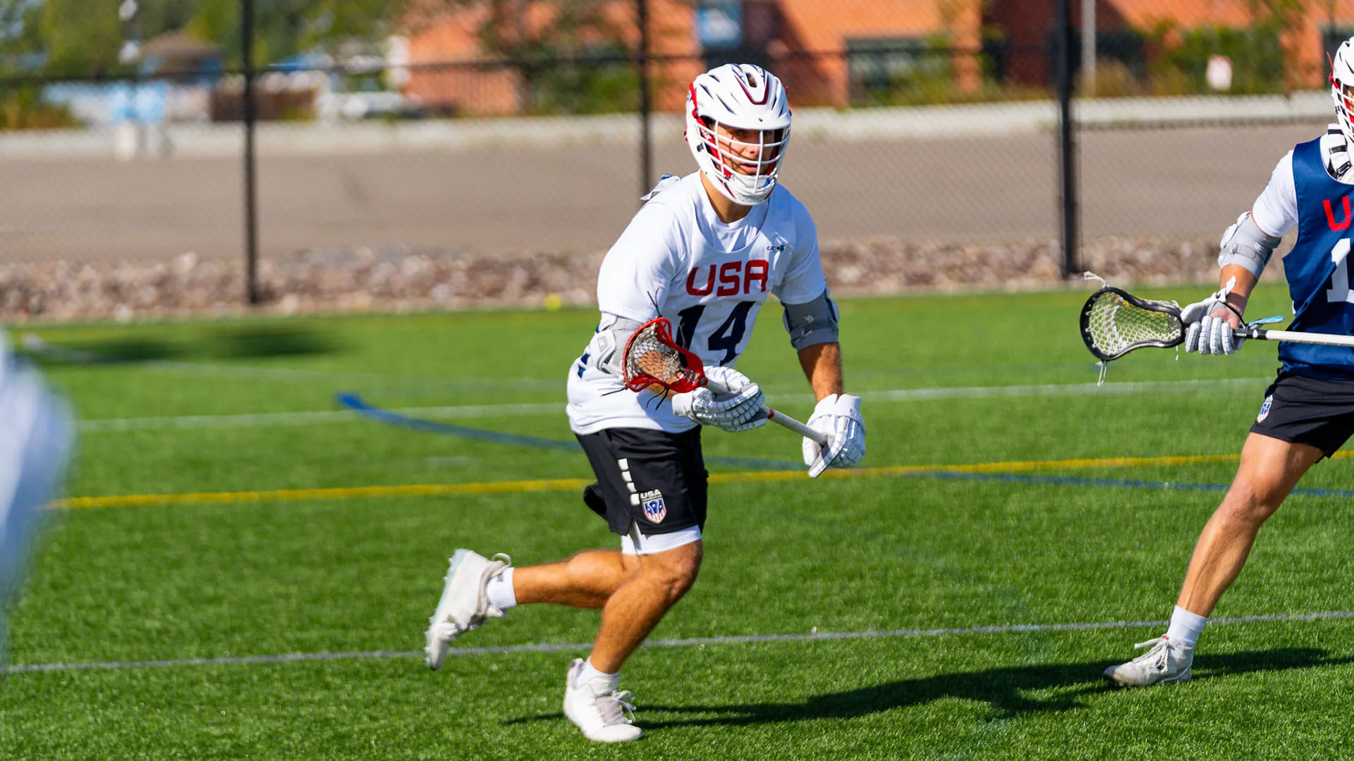 Ryan Conrad cuts towards the ball during a U.S. men's sixes training camp in Buffalo