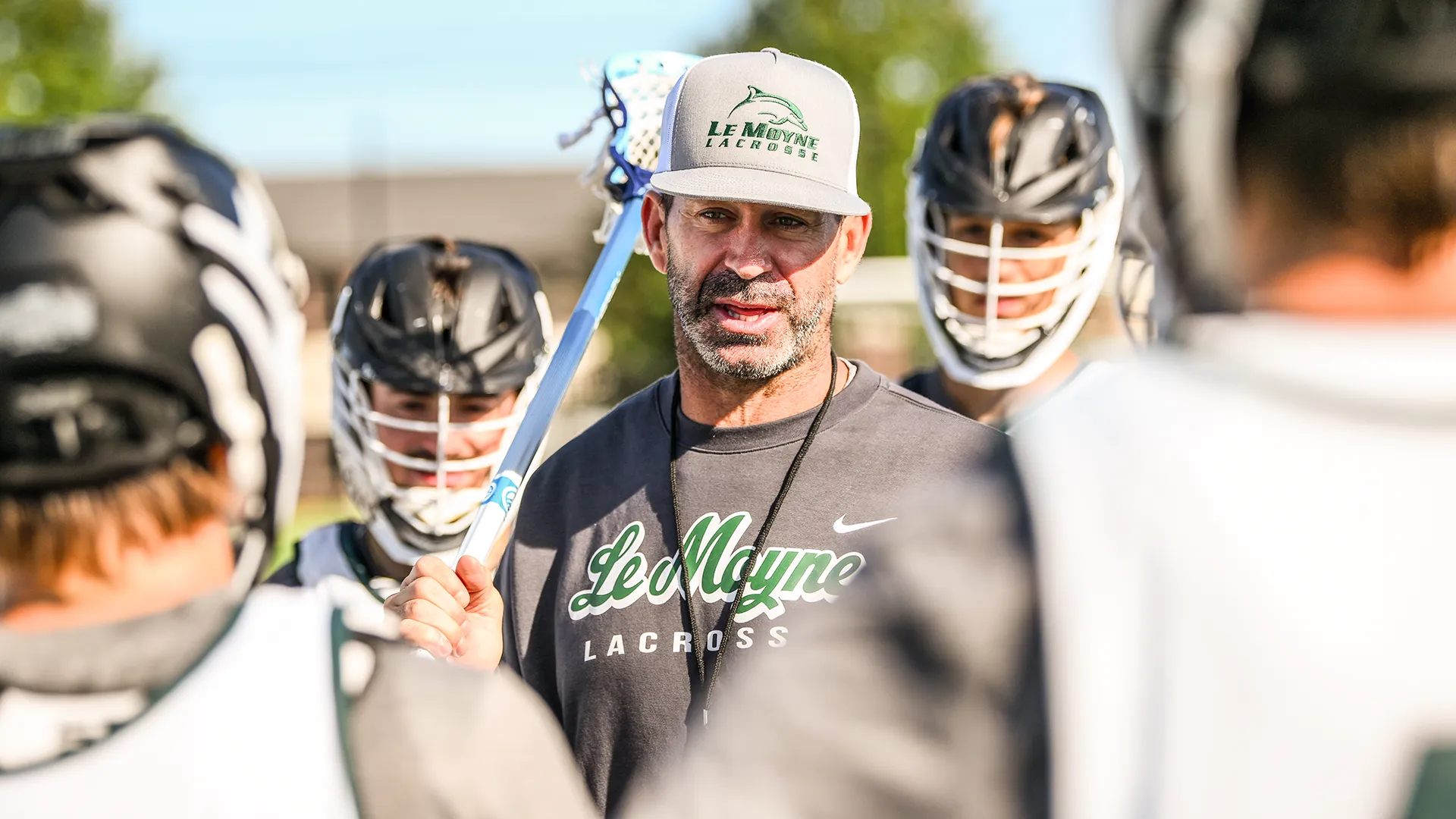 Casey Powell addresses the Le Moyne men's lacrosse team during a fall practice