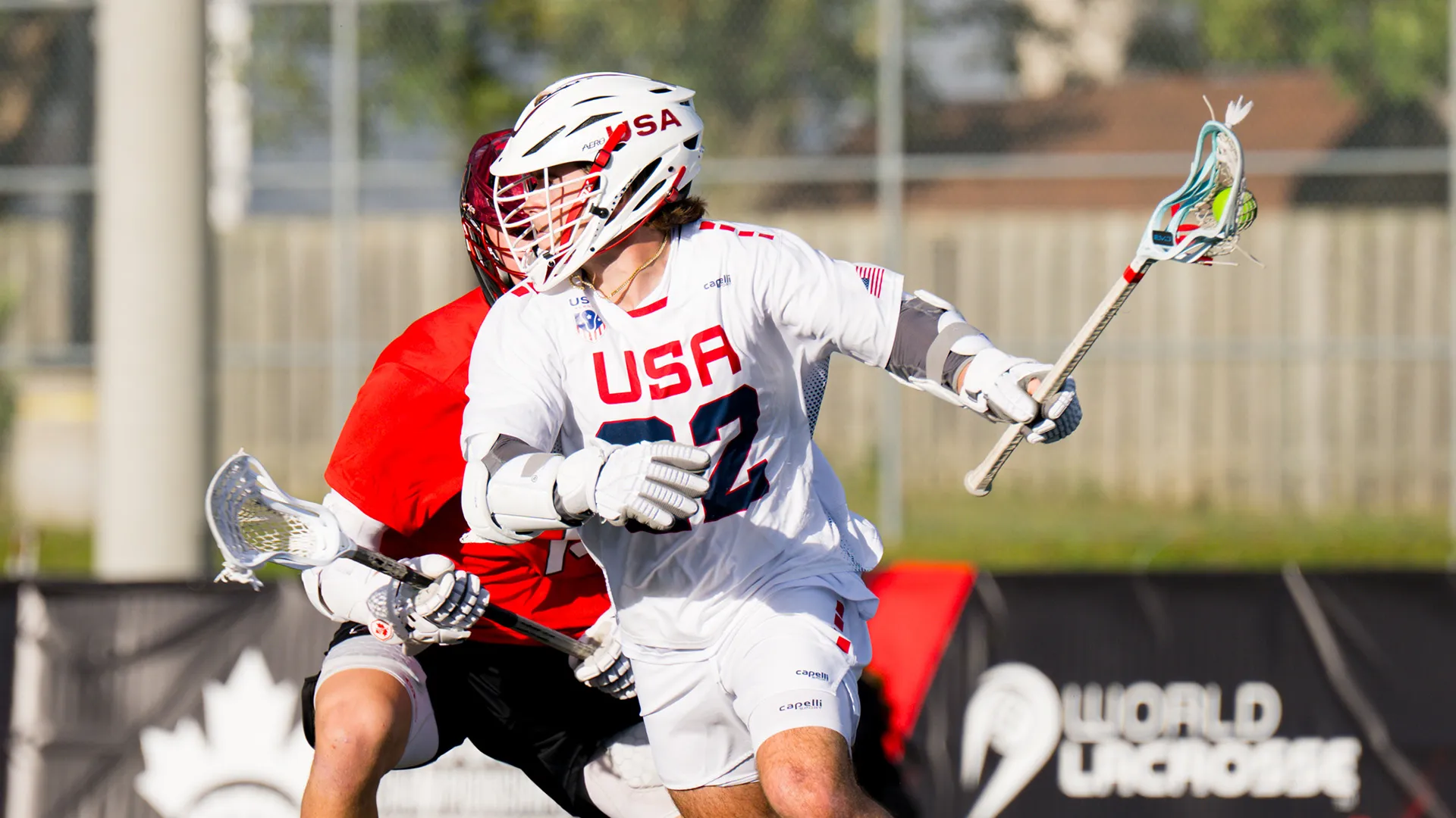 Joey Spallina protects the ball against Canada in the PALA Sixes Championship