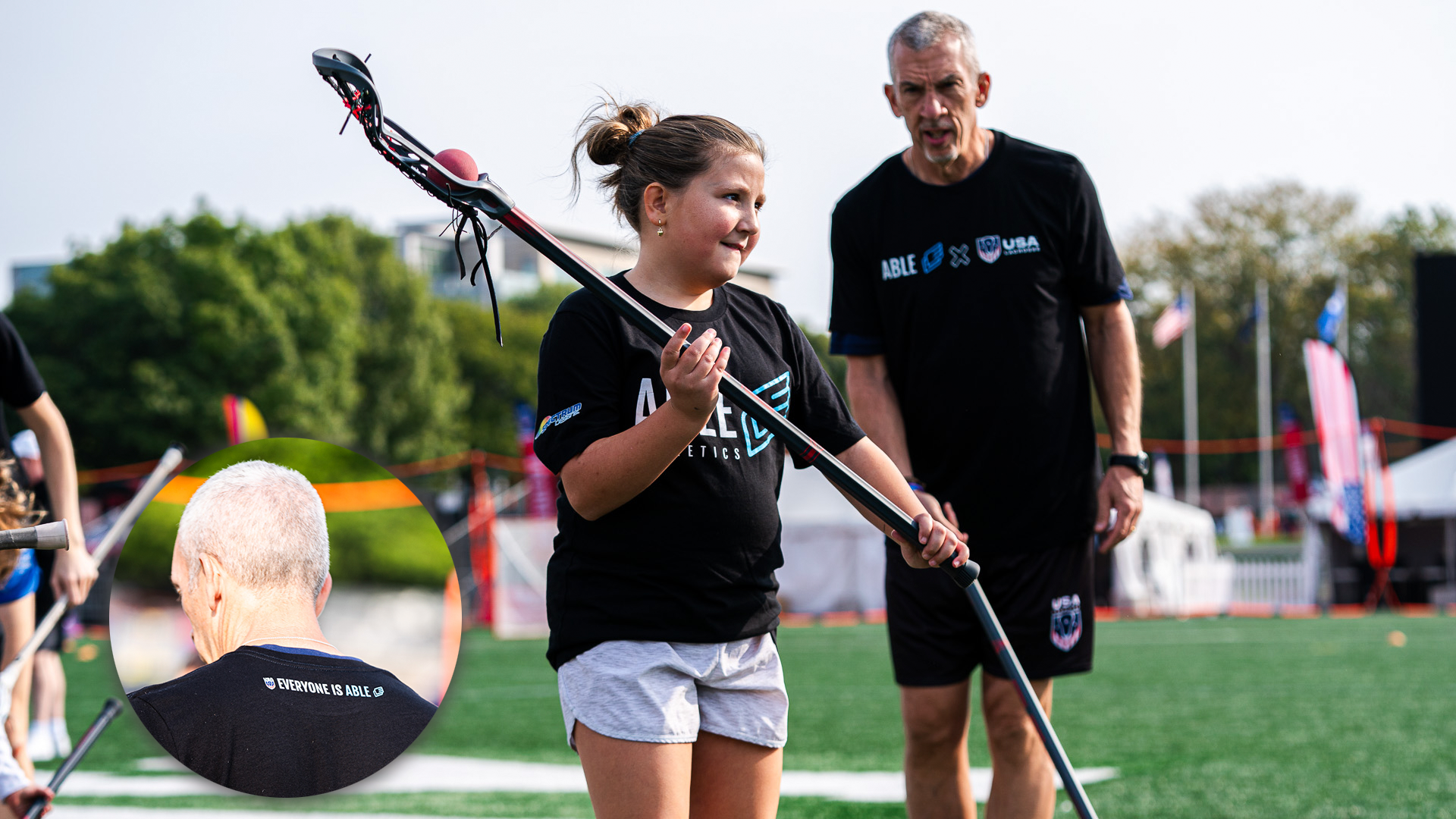 Tony Resch works with an athlete during an Able Athletics lacrosse clinic in Indianapolis as part of the USA Lacrosse Experience.