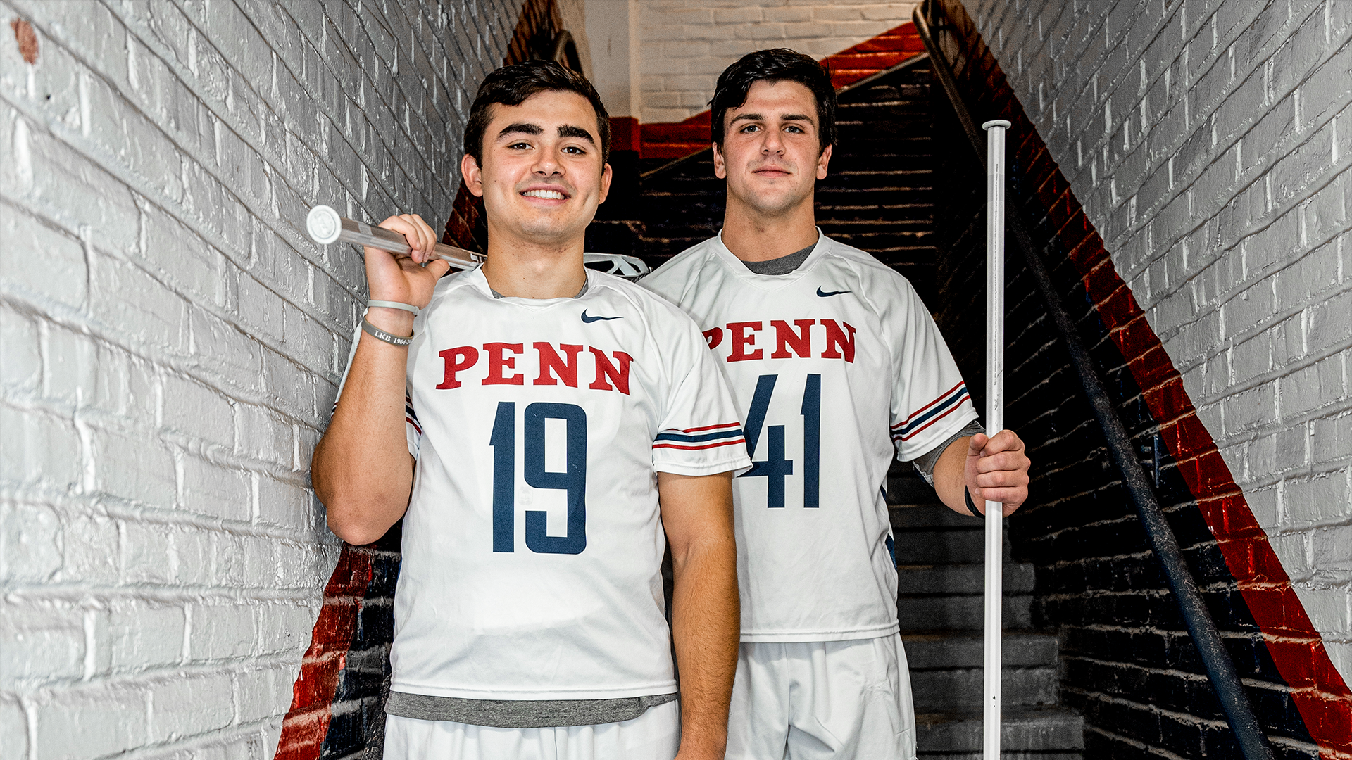 Emmet Carroll (19) and Brendan Lavelle (41) in a stairwell at Penn