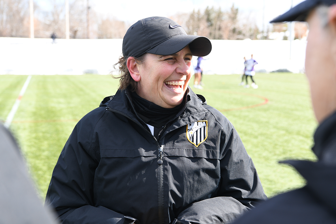 women's lacrosse official during pregame