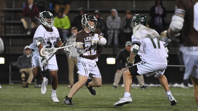 Loyola's Mustang Sally and Chase Gregory hound Lehigh's Grant Rodny