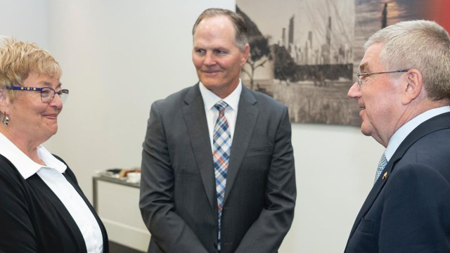 Scherr (center) was appointed as CEO of the organization in 2017.