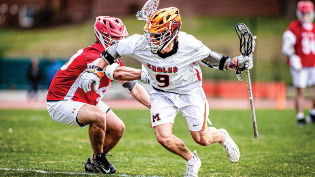 McDonogh (Md.) attackman Brendan Millon in action against the Hill Academy (Ontario)