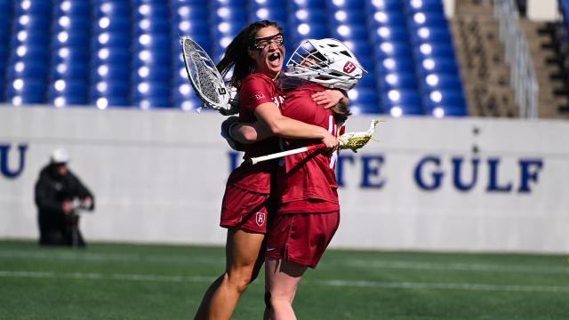 Harvard players celebrate a win over Navy