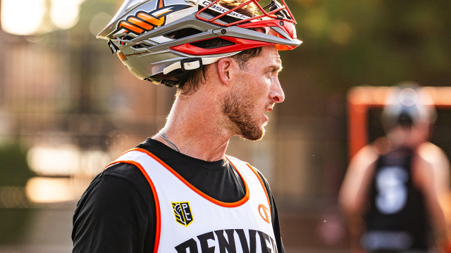 Jared Bernhardt during a Denver Outlaws practice with helmet tilted atop his head