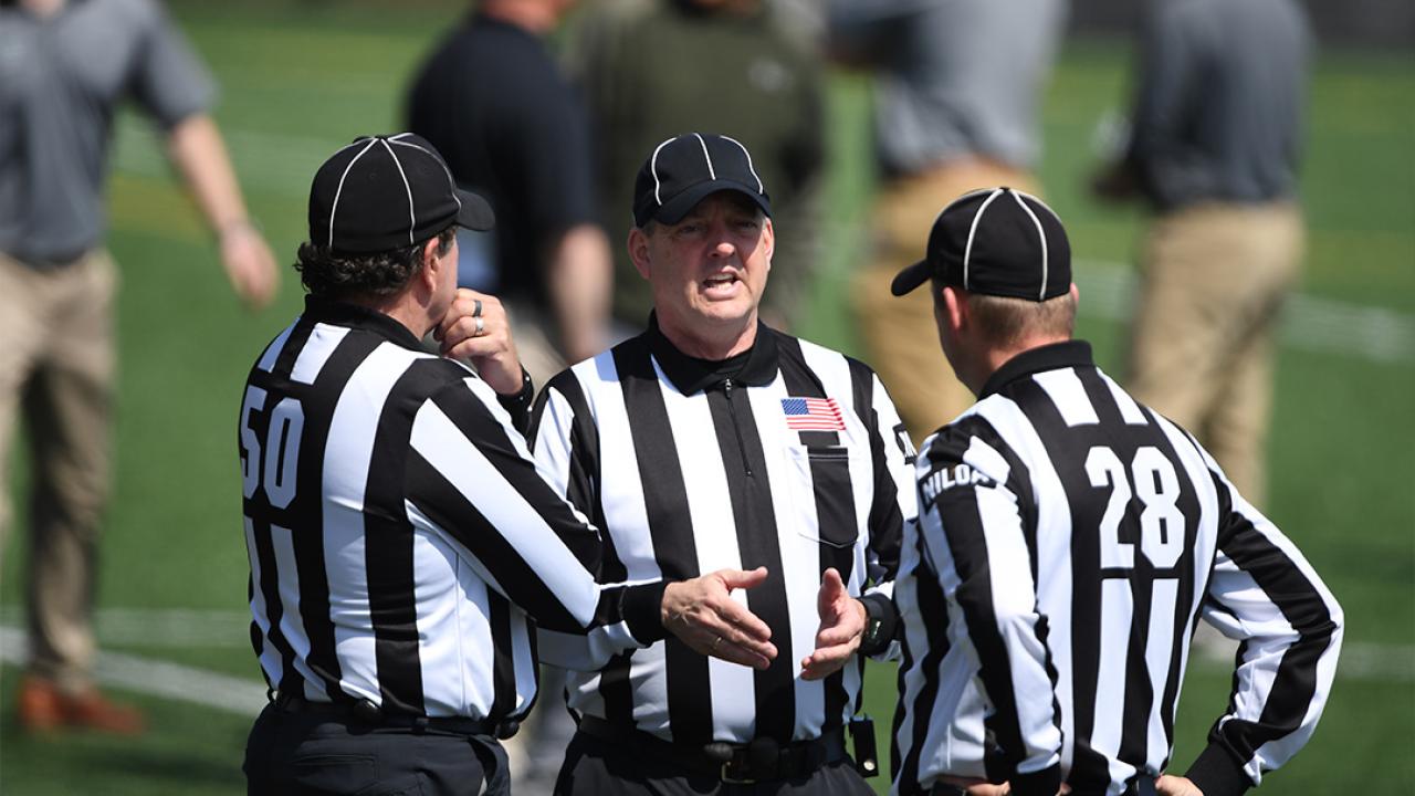 Officials huddle