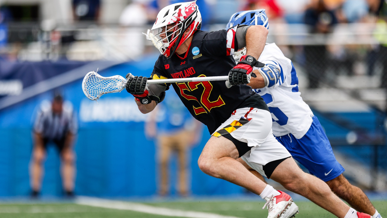Maryland's Luke Wierman wins a faceoff against Duke in the NCAA quarterfinals at Hofstra.
