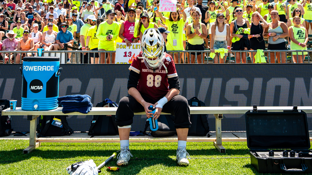 Boston College goalie Shea Dolce sits unfazed by the fandom before the NCAA championship game at WakeMed Soccer Park in Cary, N.C. Dolce's kick save in the waning seconds helped preserve BC's 14-13 comeback win over Northwestern.