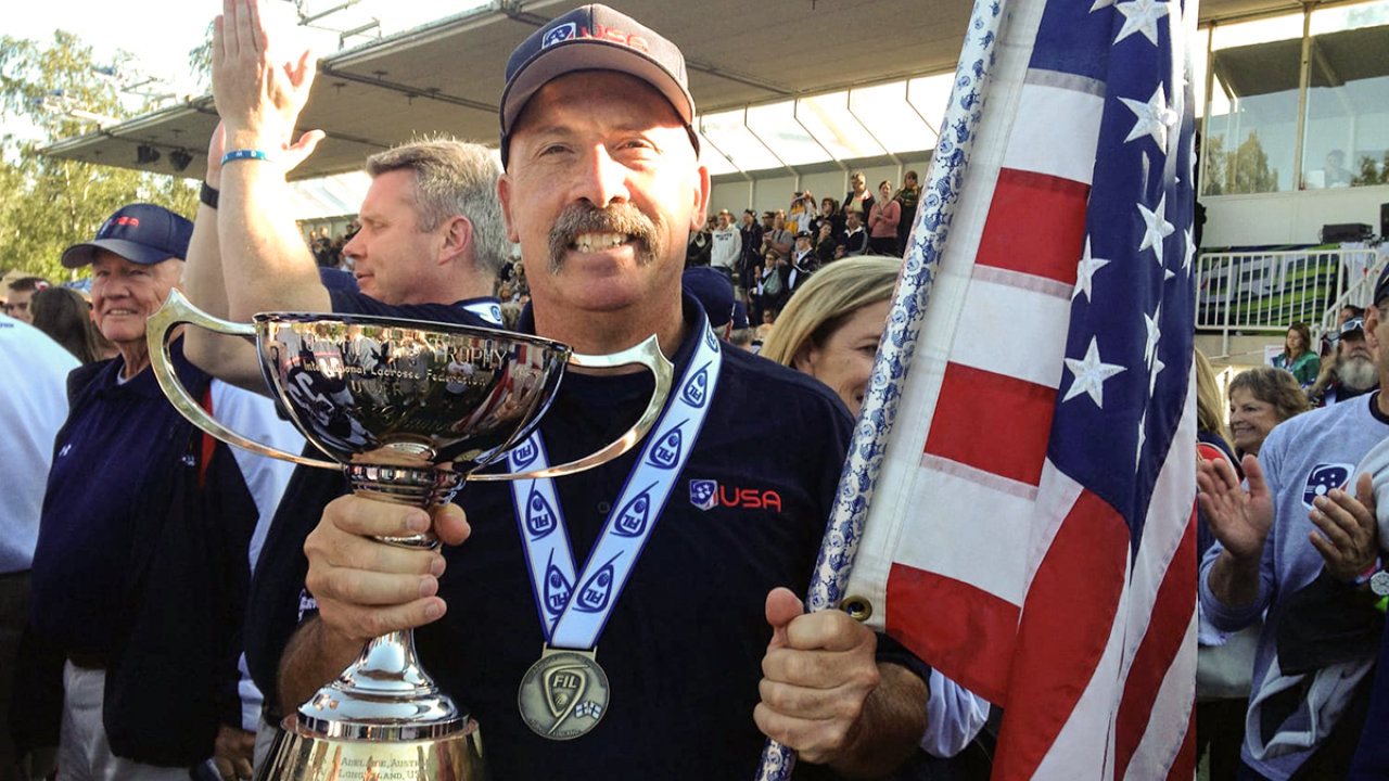 Tom Rotanz with trophy in had and a gold medal around his neck at the 2012 U19 world championship