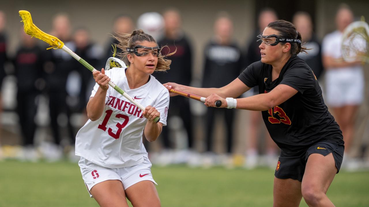 Stanford's Jordyn Case dodges a USC defender in a 2024 Pac-12 contest