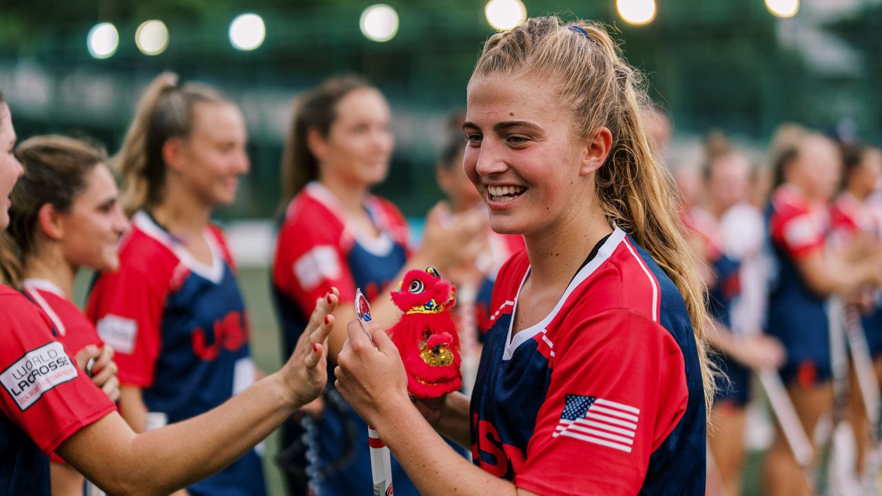 Madison Alaimo slaps hands with U.S. teammates