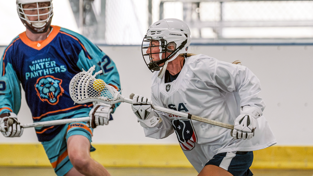 U.S. Women's Box National Team runner Ally Kennedy on the floor playing against the Mahopac Water Panthers this summer