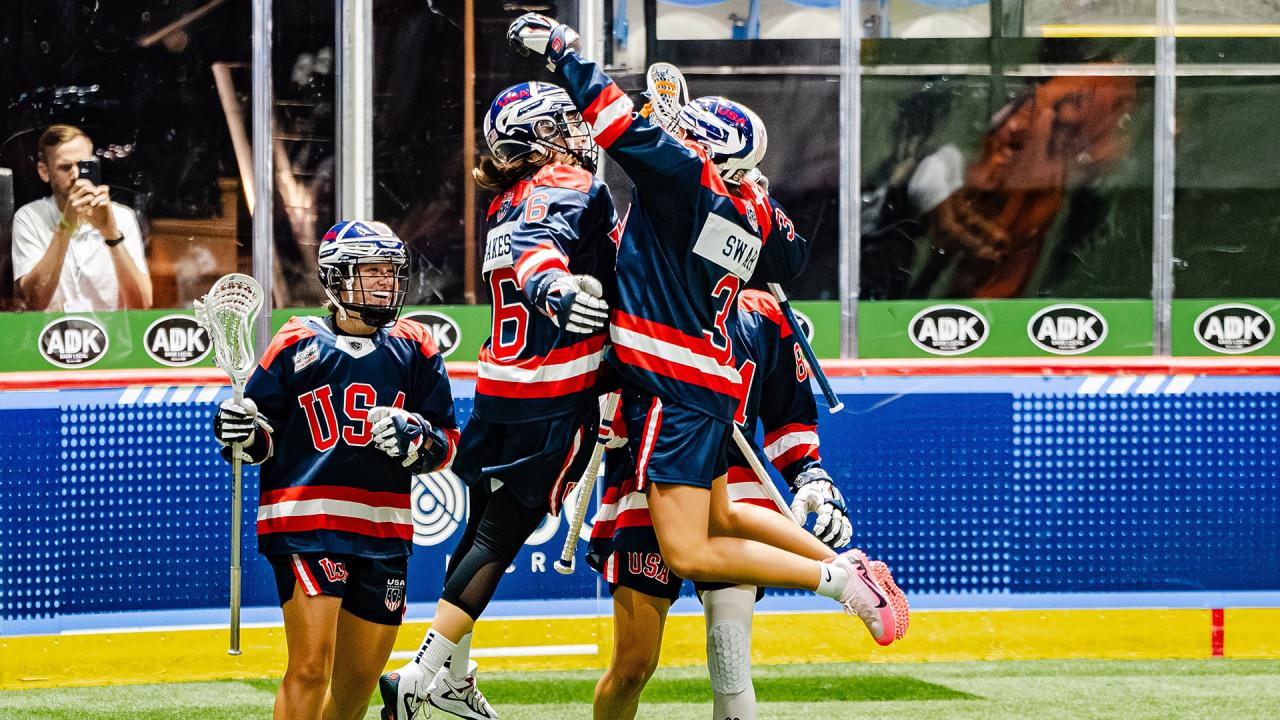 USA women's box lacrosse team celebrates a goal