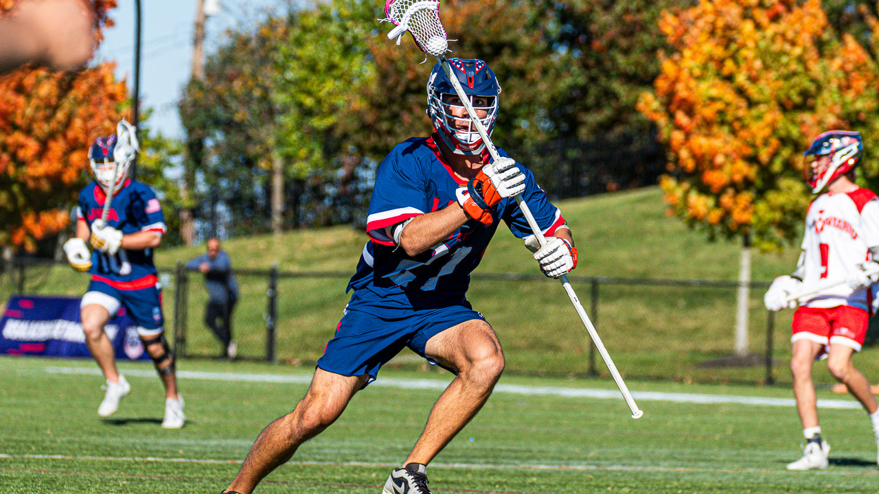 USA Select U16 long-stick midfielder Jake Ivancevic advances the ball up the field against Team Ontario.