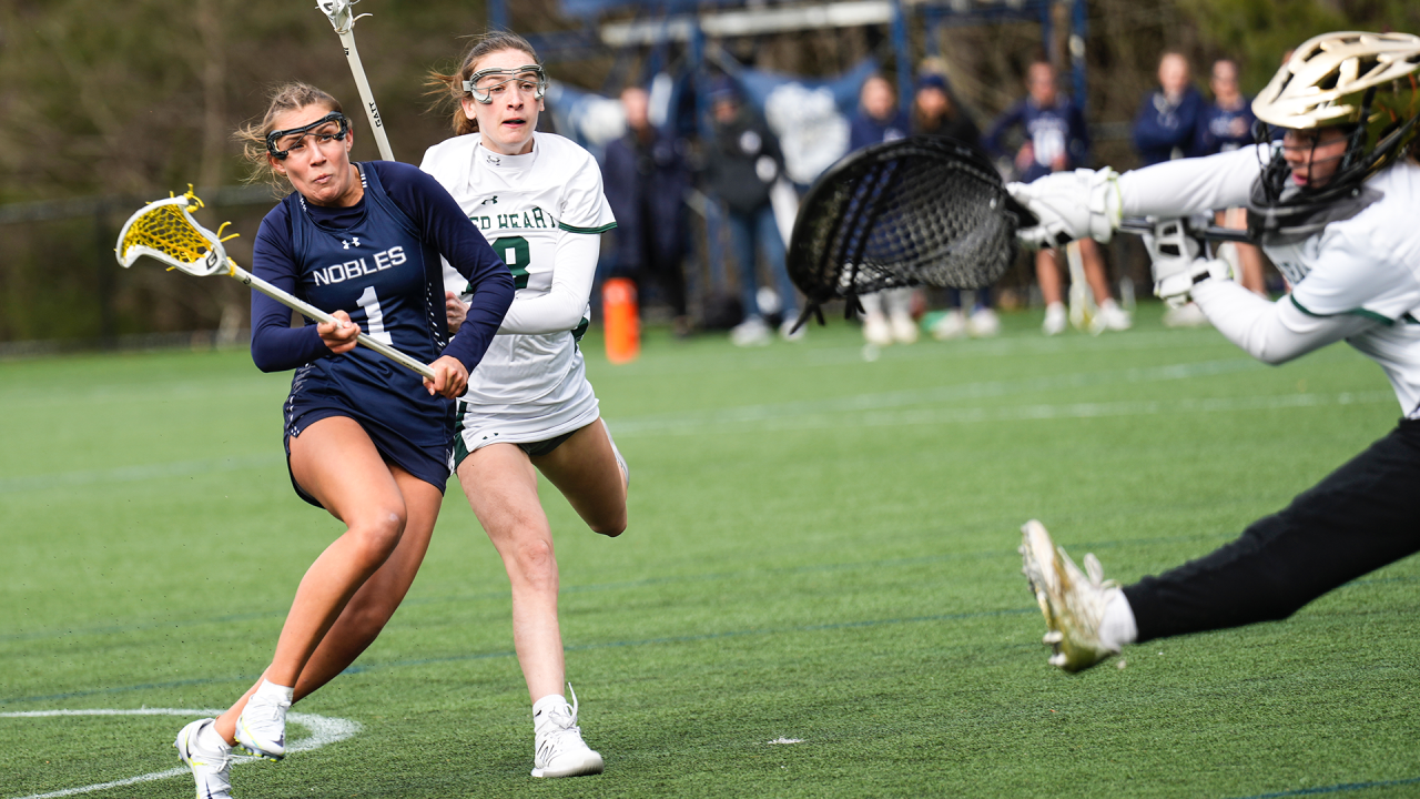 Noble & Greenough (Mass.) girls' lacrosse player Emerson Midura shoots on goal during a game against Sacred Heart Greenwich (Conn.).