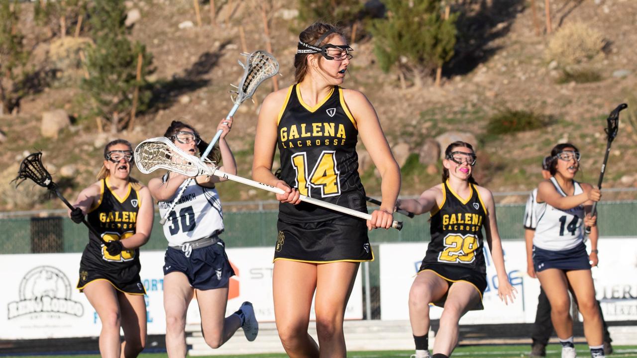 Girls lacrosse players from Galena (Nev.) high school playing.