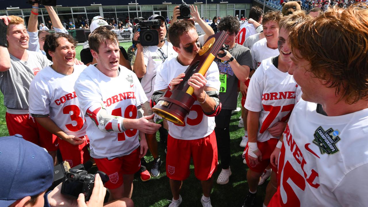 Cornell celebrates with the NCAA trophy