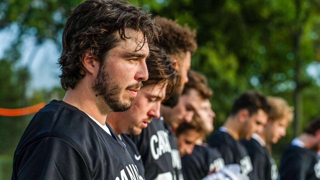 Jeff Teat and Canadian teammates during the national anthem at USA Lacrosse's Tierney Field