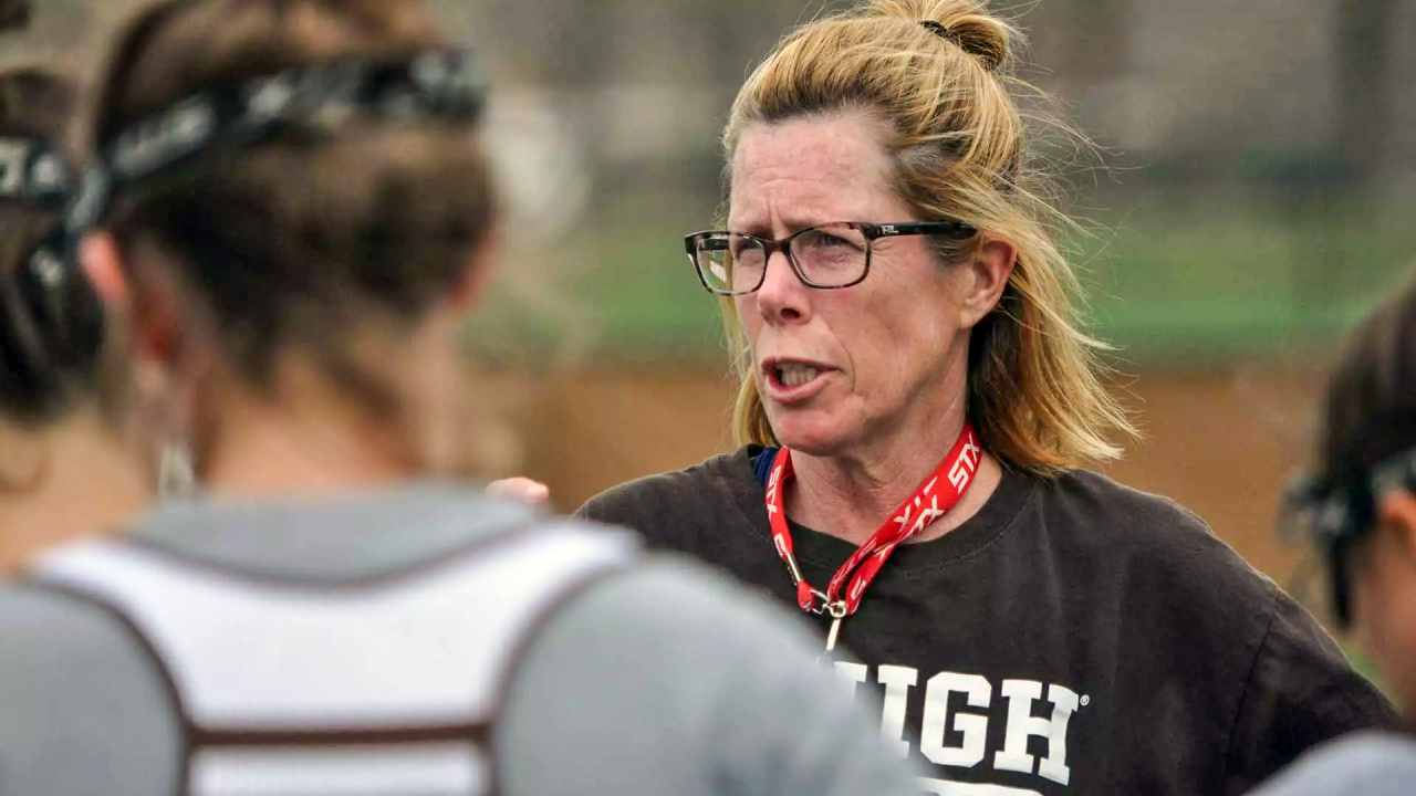 Lehigh women's lacrosse coach Jill Redfern leads a team huddle