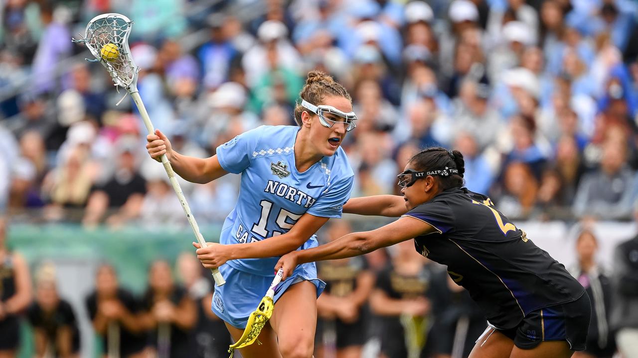 Eliza Osburn is guarded by Sammy White during the NCAA championship game in 2025