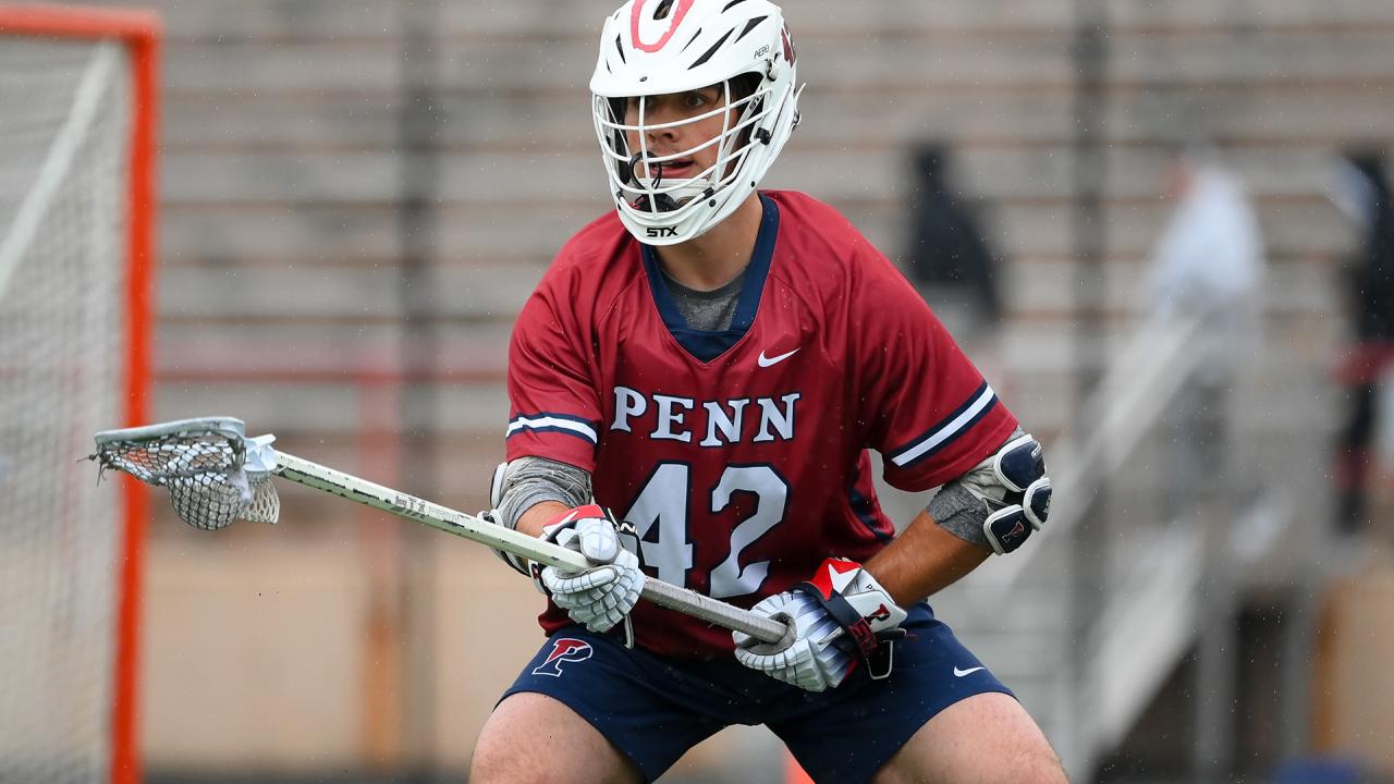 Penn defender Ryan Sullivan crouches down in his defensive stance